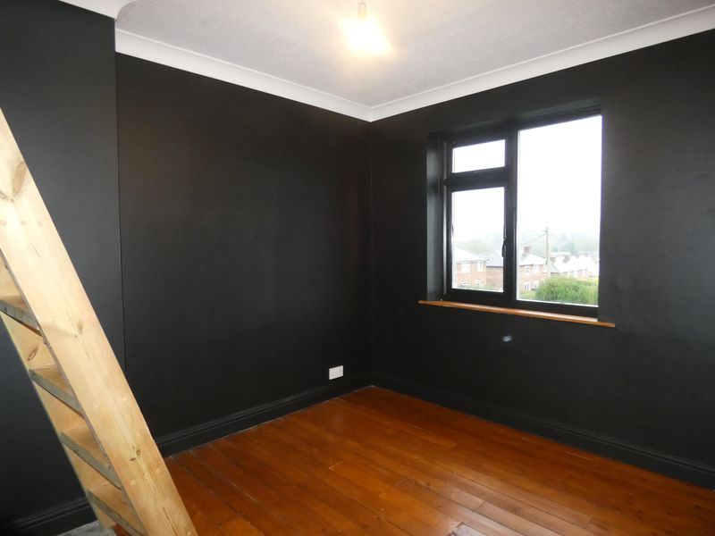 Bedroom Three- click for photo gallery